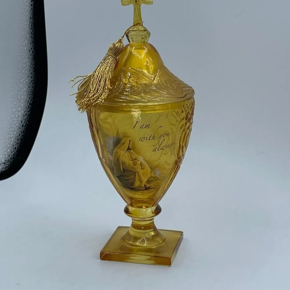 Vintage Amber Glass Religious pedestal goblet with music box lid.